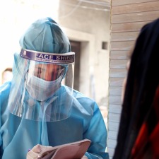 health-worker-in-PPE-house-visit