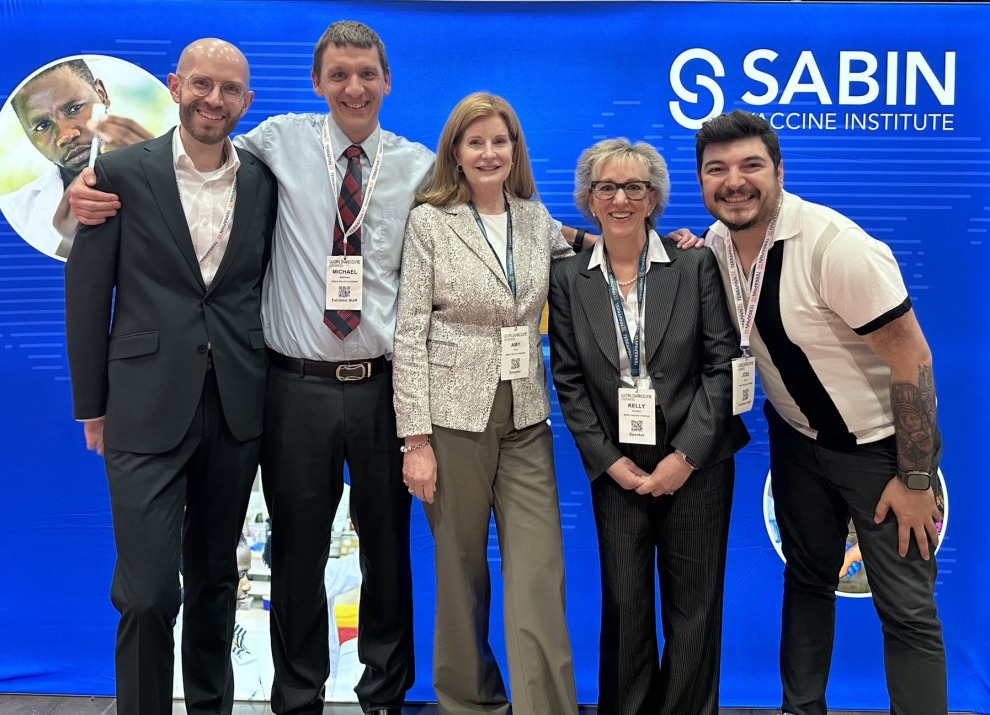 A group of people smiling at the camera.
